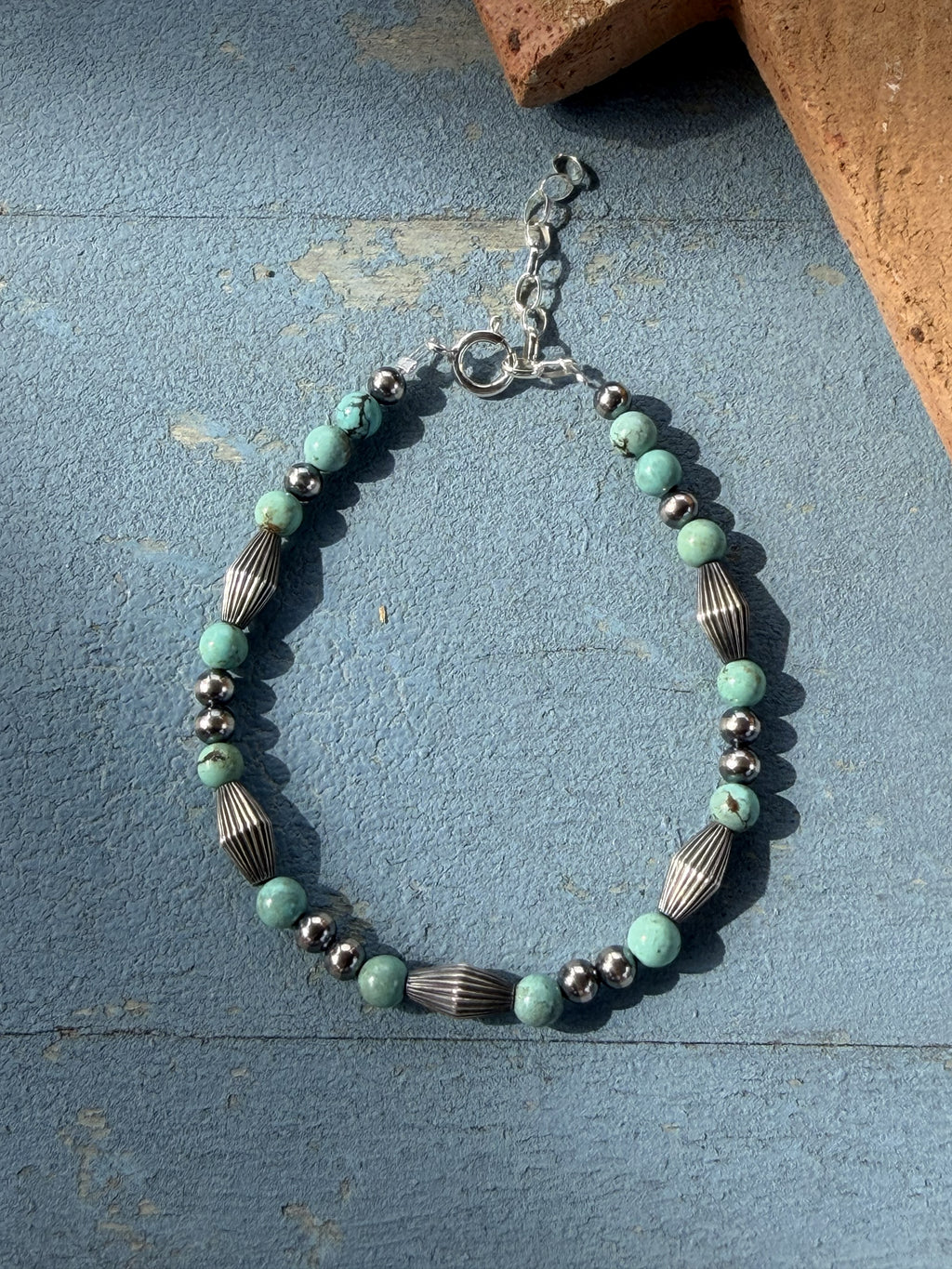 *Native American Made*  Navajo Harold Tahe:  Sterling Silver Bracelet with Turquoise and Melon Beads