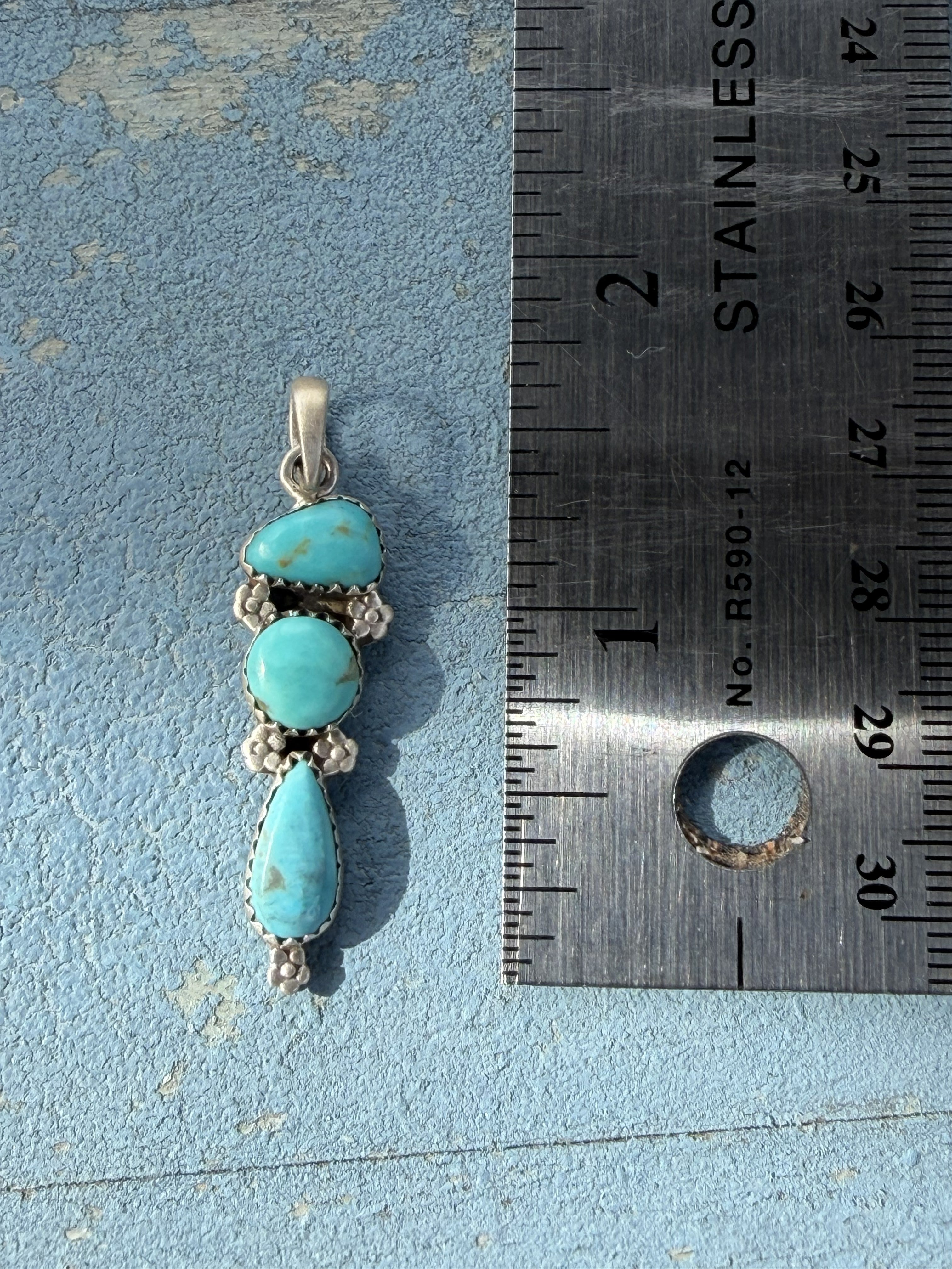 Small Sterling Silver Pendant with Turquoise Stones and Flower Embellishments