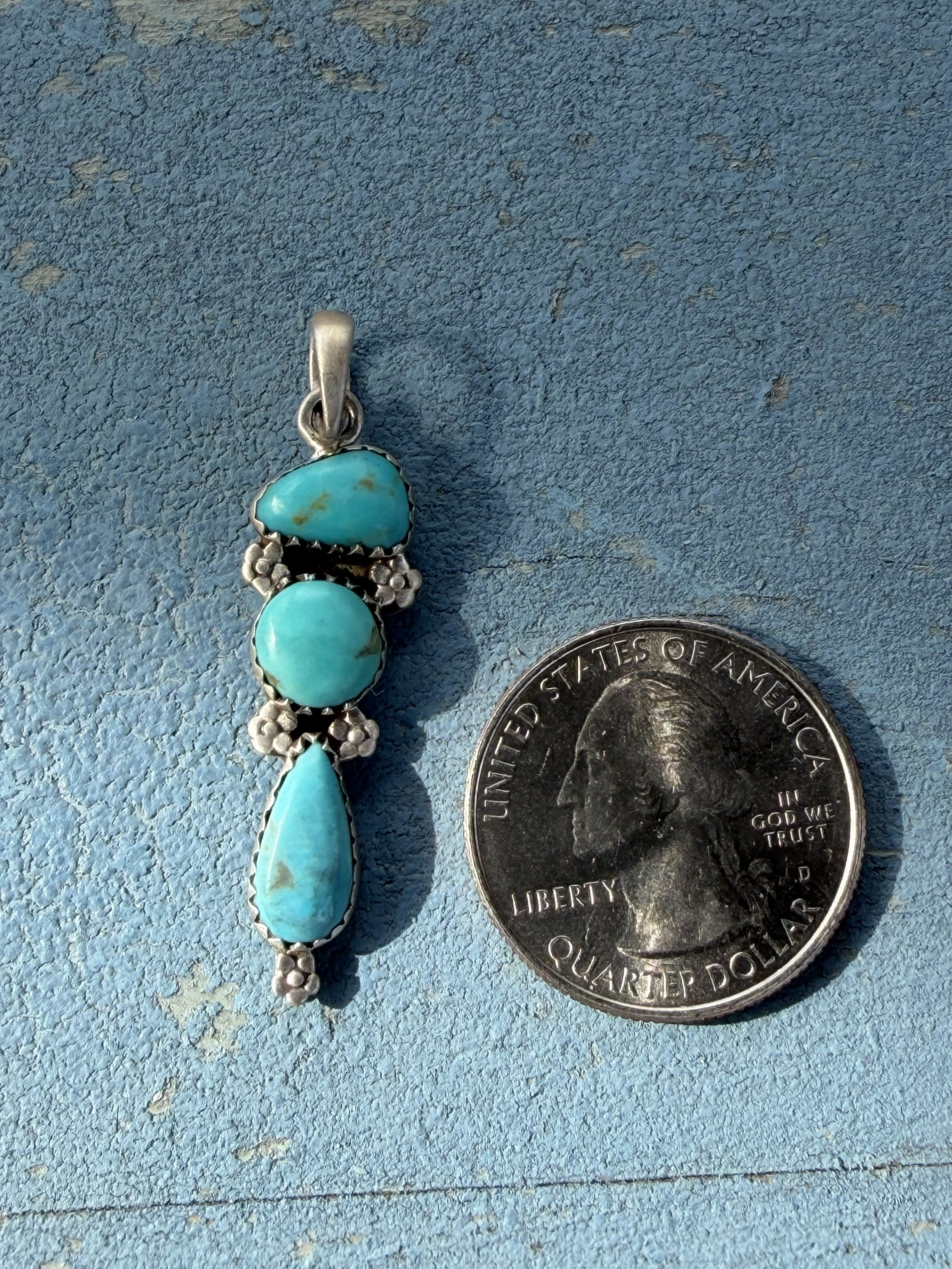 Small Sterling Silver Pendant with Turquoise Stones and Flower Embellishments