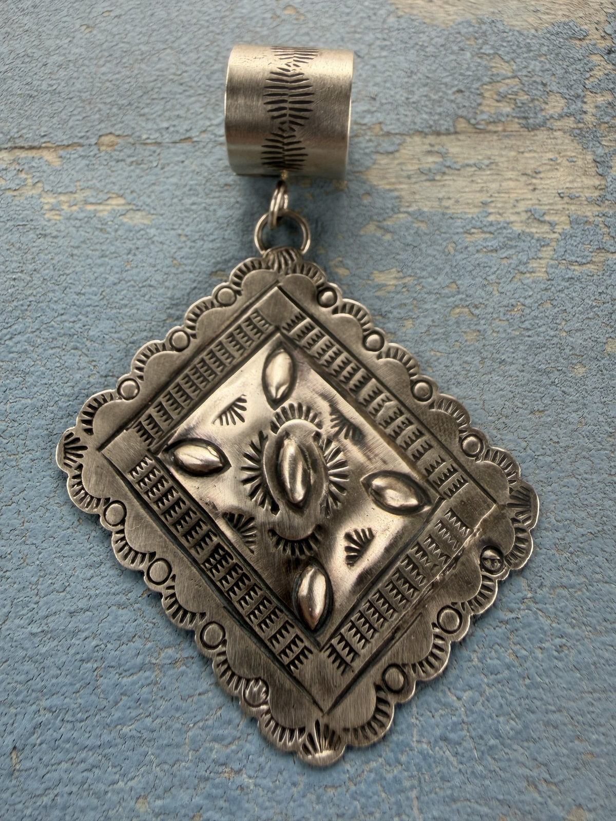 *Native American Made* Navajo Joan Begay Repousse Rhombus Pendant